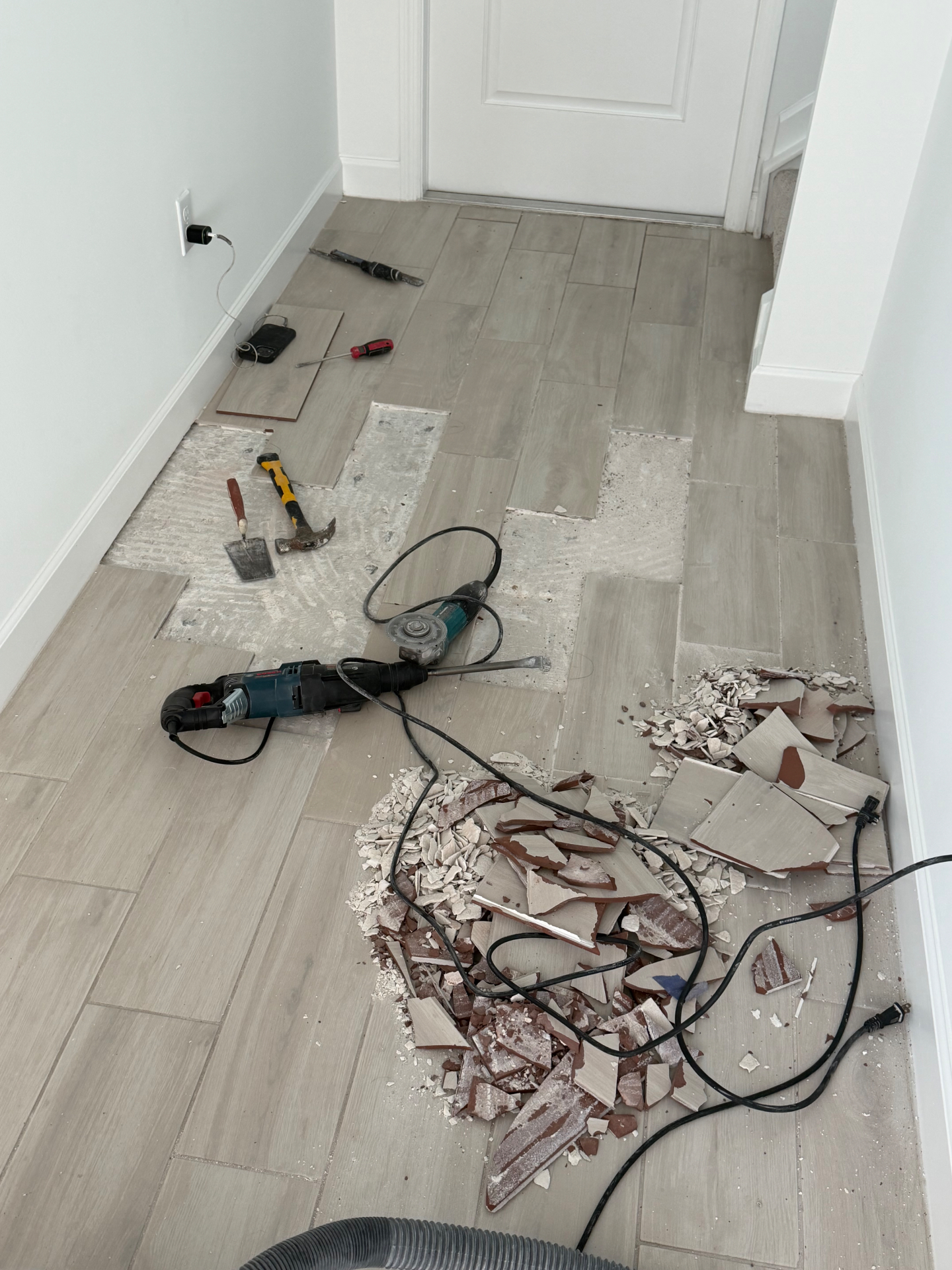 Hallway Tile Repair – Demo & Replace